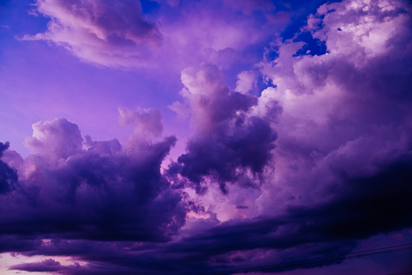 Purple sky with dark clouds